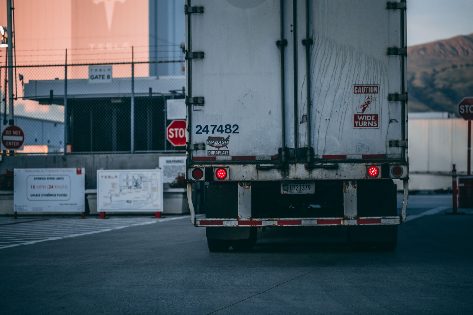ELS semi trailer positioned at a freight loading dock